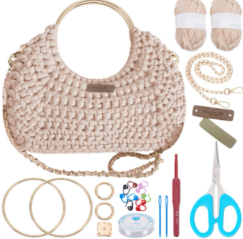 Beige chunky knit tote bag DIY kit with gold ring handles, chain strap, yarn, crochet hooks and accessories